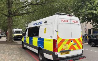 Police outside Lord's Cricket Ground in London after play was disrupted by a Just Stop Oil (JSO) protest