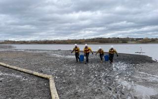 The partially drained Welsh Harp Reservoir