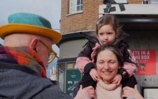 Poet Alan Wolfson performed poetry at the phone box outside Hornsey Town Hall as part of the Crouch End Lit Fest (Image: David Winskill)