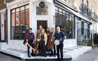 l-r: Dots manager Rob Matthews, owner Lindsay Douglas, assistant Martha Dowland, Luthier Ludevine Brouillet, brass fixer Dragan Vujovic, owner Ian Douglas