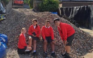 Year 6 students Bella, Carys, Jace and Ryo miss the school garden (Image: St Paul's Primary)