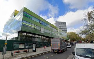 A man has been arrested after two teenagers were injured in an acid attack outside Westminster Academy near Maida Hill.