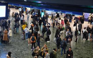 A view of the concourse at Euston train station in north London, where Network Rail switched off the large advertising board following criticism