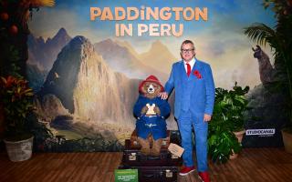 Hugh Bonneville meets Madame Tussauds' latest figure on the red carpet at the Paddington in Peru premiere.