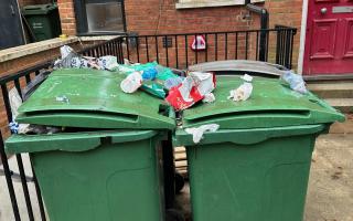 Stuart Windsor's wheelie bins are filled to overflowing with litter from tourists visiting Hampstead Heath