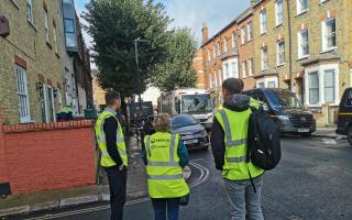 Cllr Judy Dixey joined a team from Veolia collecting rubbish (Image: Judy Dixey)