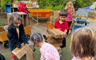 Children problem solving in the outdoor space at Tetherdown (Image: Tetherdown Primary School)