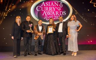 Namaaste Kitchen Chef Sabbir Karim and his wife Aneela proudly accept Best Restaurant of the Year Award