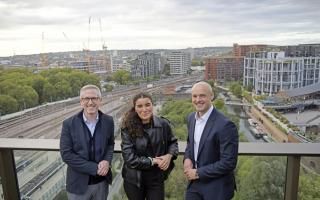 Councillor Nasrine Djemai, (centre), John Mulryan, Managing Director Ballymore (left) and Rob Beacroft, Lateral Co-Founder (right) in front of the Camley Street site